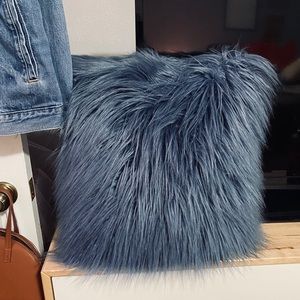 Blue fuzzy pillow
